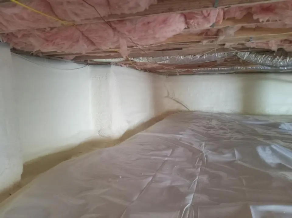 Crawl space encapsulation with closed-cell spray foam for Commercial Roof Restoration in Coolidge